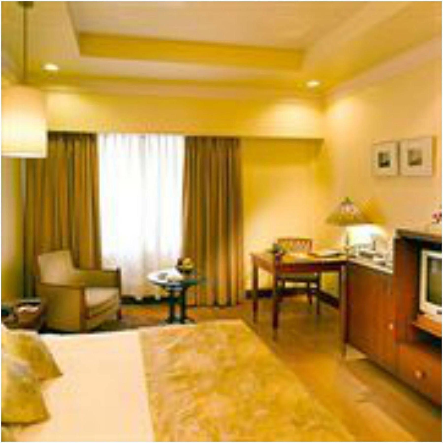 Hotel Hindusthan International, Калькутта Номер фото